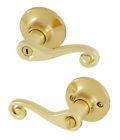 8108002 814113018292 Honeywell Scroll Privacy Door Lever Polished Brass