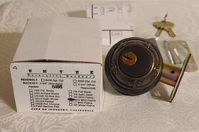 8456 Emtek Tuscany Deadbolt Lock Medium Bronze Patina