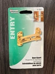 Defender Security 9897 Swing Bar Lock Entry Door Guard Brass Finish. Fixed Price $8.00.