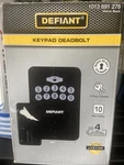 Defiant Radius Matte Black Single Cylinder Electronic Keypad Deadbolt Lock. Fixed Price $16.00.