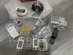 Kwikset 158-RDT-15-SMT-6AL-STRKP-K3 Milan Single Cylinder Deadbolt Satin Nickel. Fixed Price $26.99.