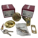 2 Kwikset Single Cylinder Deadbolt Featuring Smartkey Polished Brass 96600-573. Fixed Price $25.74.