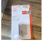 Honeywell Electronic Keyless Deadbolt W/ Satin Nickel Exterior 8712309L. Fixed Price $34.49.