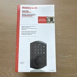 Honeywell Touchscreen Keyless Electronic Deadbolt Matte Black Exterior P8635004. Fixed Price $42.50.