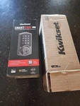 Kwikset 99160-039 Smartcode Zwave Lock Bronze Finish Unopened. Fixed Price $149.00.