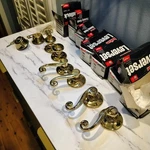 Lot Of 7 Kwikset Door Hardware - Deadbolt, Leversets, Dummy Knobs/levers Brass. Fixed Price $119.99.