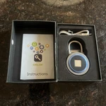 Oklok Blueprint & Fingerprint Smart Padlock - New / Open Box. Fixed Price $24.99.