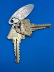 Two High Security Corbin Emhart Factory Cut Keys. Fixed Price $15.00.