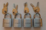 Abus 64TI/25 Padlocks. Keyed Alike, W/ 8 Keys Total. Perfect For Luggage! 25MM. Fixed Price $18.99.