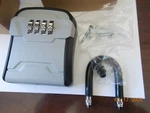 New Puroma LB231 Door Hanger Lock Box With 4 Number Combination, No Instructions. Fixed Price $8.99.