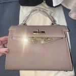 Amazon Beige Top Handle Clutch Handbag. Fixed Price $59.50.