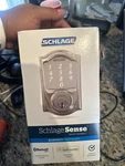 Schlage Sense Camelot Trim Smart Deadbolt - Satin Nickel. Fixed Price $250.00.