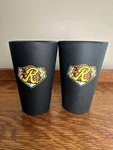 Rochester Red Wings -plates Garage 2 Black Silicone Pint Glasses. Fixed Price $18.00.