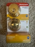 New Box Honeywell Single Cylinder Deadbolt Polished Brass Cerrojo. Fixed Price $30.00.