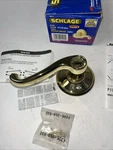 Schlage Flair Hand Dummy Non Turning Lever Bright Brass F170FLA605RH. Fixed Price $18.00.