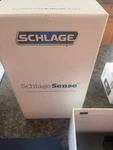 Schlage Sense Smart Deadbolt Camelot Trim Satin Nickel BE479AA With Wifi Adaptor. Fixed Price $120.00.
