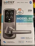 Door Lockly Model 6S Latch Smart Bluetooth Re-key Alexa/google Silver. Fixed Price $105.00.