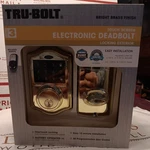 Tru-bolt Electronic Deadbolt Bright Brass Finish Touch Screen & Remote Opener 2K. Fixed Price $59.95.