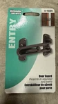 Defender 10309 Swing Bar Door Guard Bronze. Fixed Price $9.95.