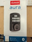 Kwikset 99420-002 Aura Bluetooth Programmable Keypad Door Lock Deadbolt -bronze. Fixed Price $99.00.