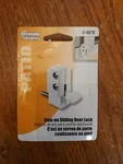 Defender Security 9879 Sliding Door Lock, White Finish. Fixed Price $5.00.
