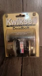 Kwikset Deadbolt Lock Brass Finish Brand New. Fixed Price $14.00.