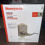 Honeywell Electronic Exterior Entry Lever Door Lock. Fixed Price $100.00.