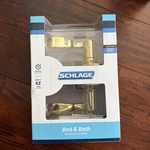 New Schlage Bed & Bath Brass Door Handle Lever Locking Set F40VACC605. Fixed Price $30.00.
