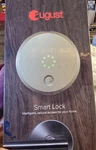 August Smart Lock Model AUG-SL01-M01-C01 (champagne). Fixed Price $75.00.