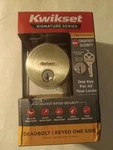 Kwikset Low Profile Round Keyed Deadbolt Lock Smartkey Satin Nickel 92580-016. Fixed Price $7.99.