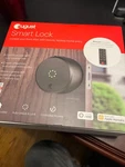 August Wi-fi Smart Lock And Keypad, Black ASL-05, AK-R2. Fixed Price $130.00.
