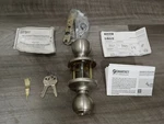 Kwikset Polo Keyed Entry Knob Featuring Smartkey Satin Nickel Model 94002-549. Fixed Price $60.00.